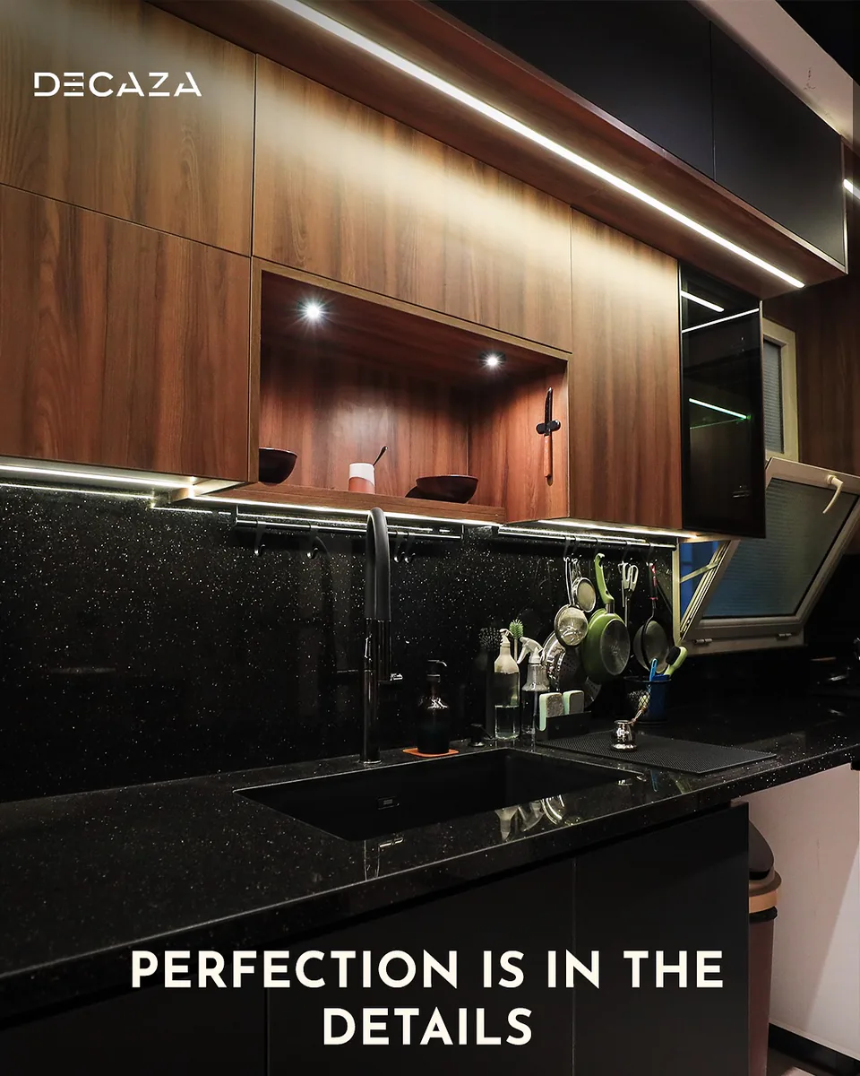 Dark Decaza kitchen with integrated lighting
