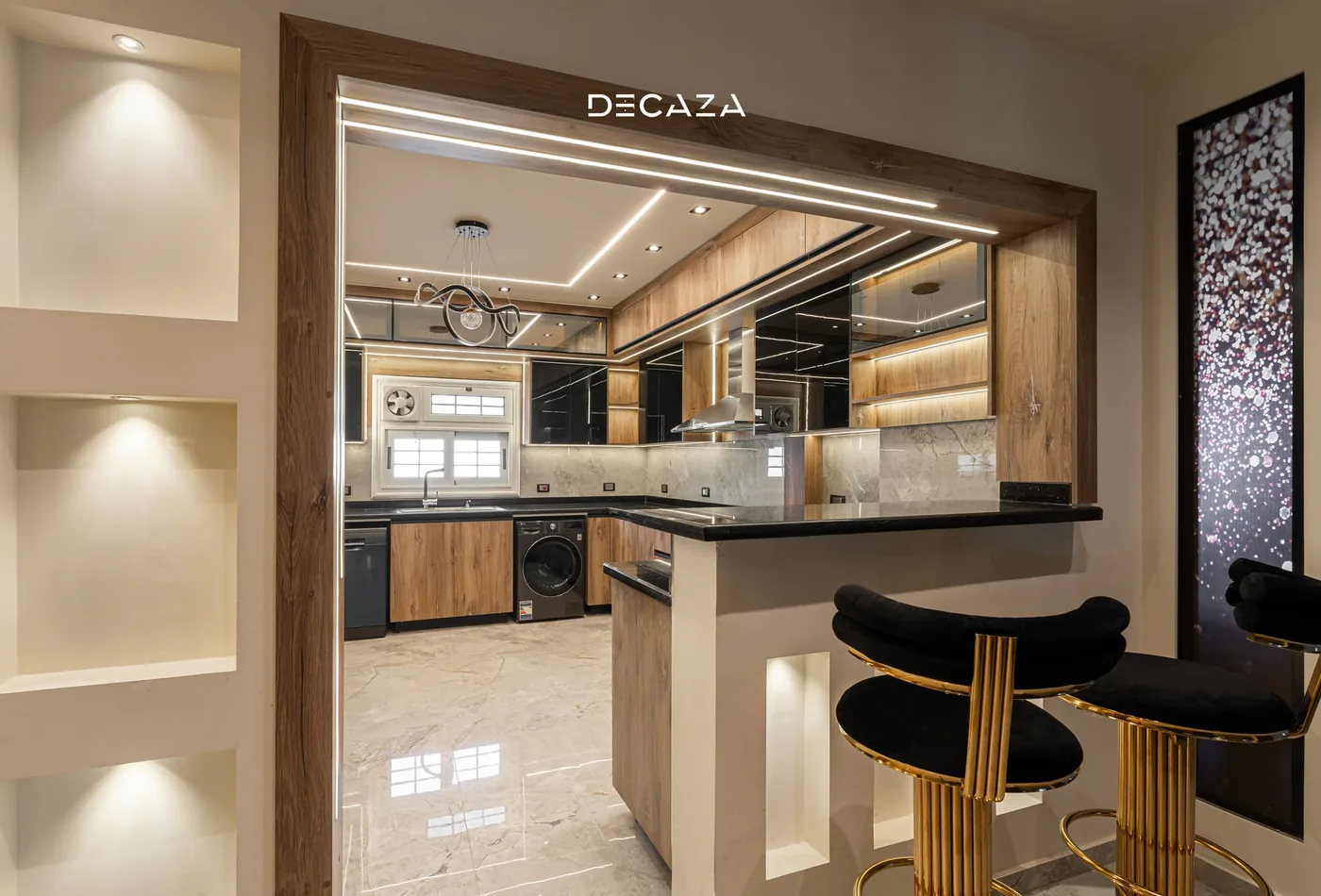 Decaza kitchen installation with warm wood and black surfaces
